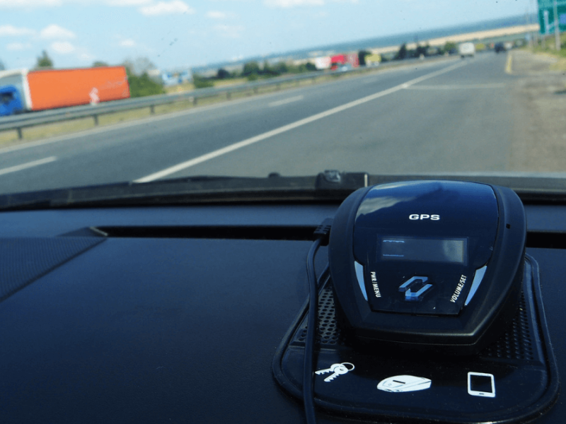 view of dash of a car with a radar detector
