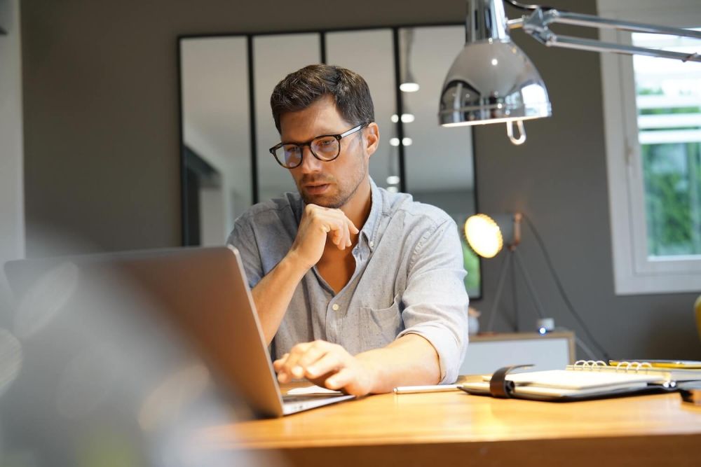 business man working at his desk at a computer