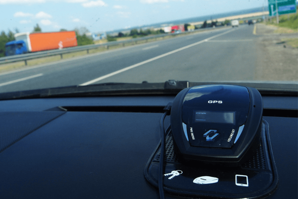 view of dash of a car with a radar detector