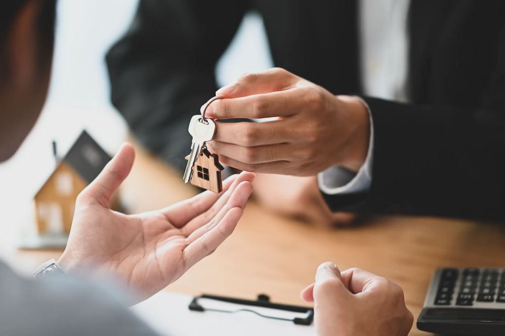 new home owner receiving the keys