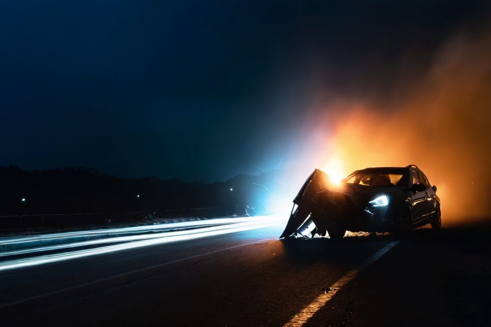 image of car crash dangerous accident on the road at night.