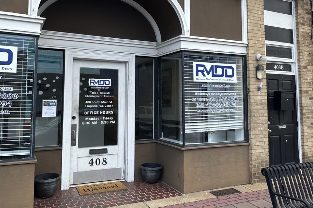 Law office entrance with RMDD signage, business hours, and contact info in Emporia, VA.
